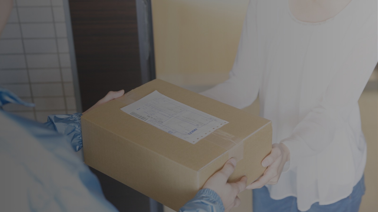 Pharmacist assisting customer at modern pharmacy counter